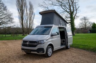 A van on a country gravel drive